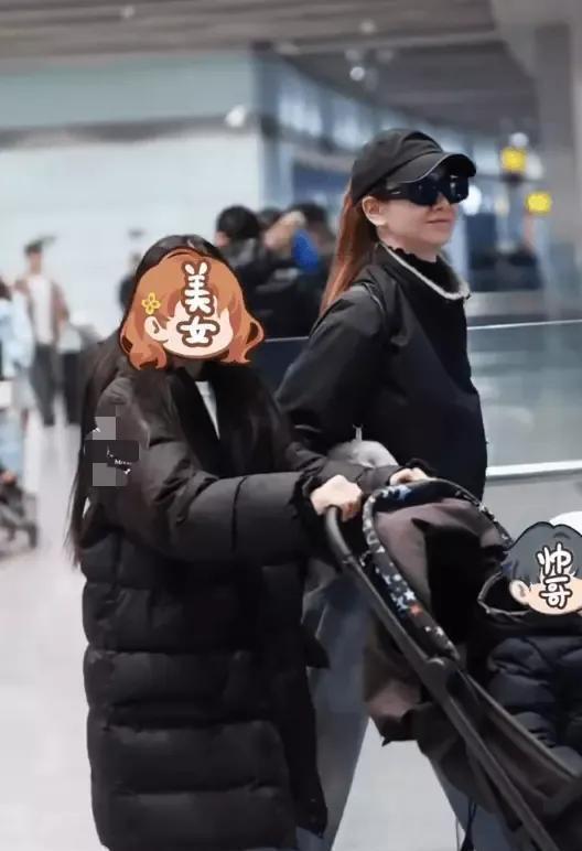 戚薇一家四口返京，10岁的Lucky推着弟弟像个小大人，李承铉则是充当搬运工(图3)